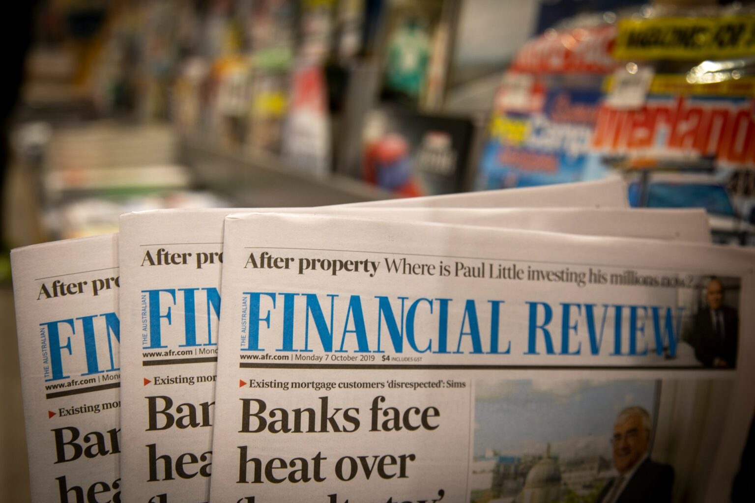 A person reviewing retirement planning and FIRE financial spreadsheets on a laptop